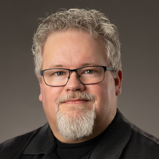 Headshot of Aaron Hockley